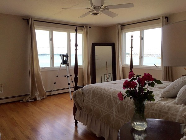 300 Newport Road Hull, MA 02045 - Photo 11 of 22 a bed room with a bed and a window