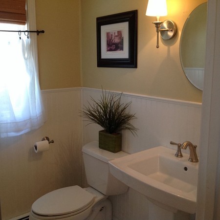 300 Newport Road Hull, MA 02045 - Photo 17 of 22 a bathroom with a toilet sink and mirror