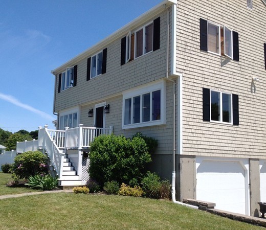 300 Newport Road Hull, MA 02045 - Photo 19 of 22 a front view of a house with a yard