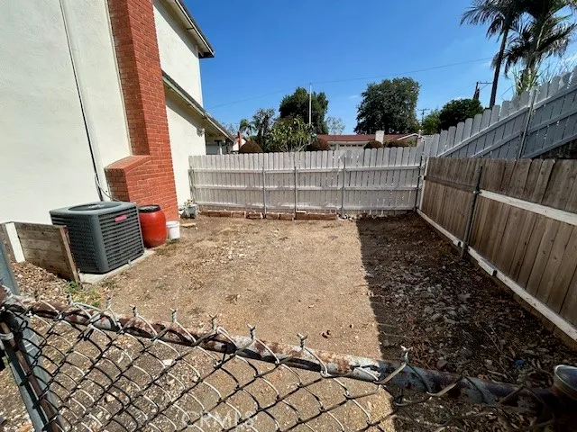 a view of a back yard of the house