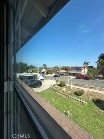 a open kitchen with stainless steel appliances kitchen island granite countertop a stove and a microwave