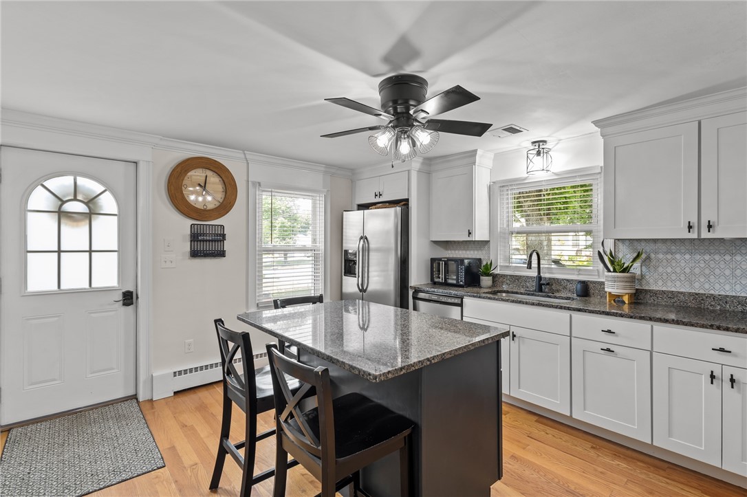 33 Fairhaven Road Cumberland, RI 02864 - Photo 10 of 36 Kitchen with door to/from driveway