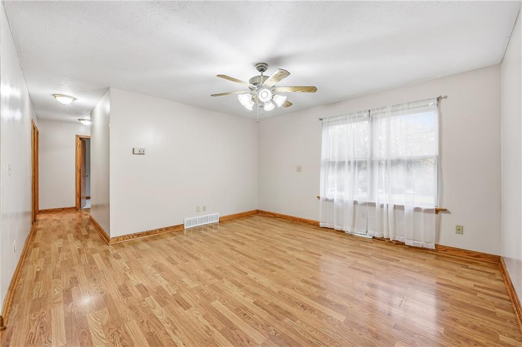 3451 East State Road Jamestown, PA 16134 - Photo 19 of 49 a view of an empty room with a window