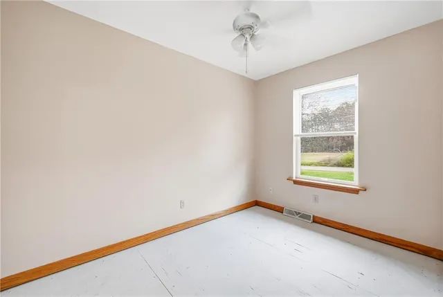 a view of empty room with a window