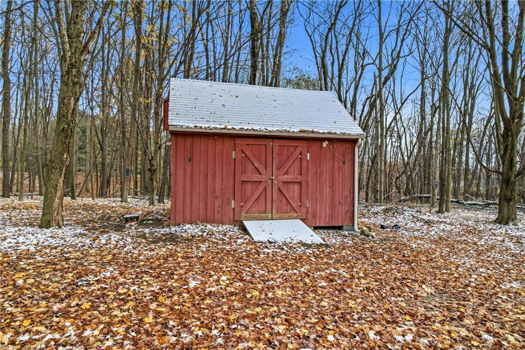 3451 East State Road Jamestown, PA 16134 - Photo 46 of 49 a wooden house with trees in front of it