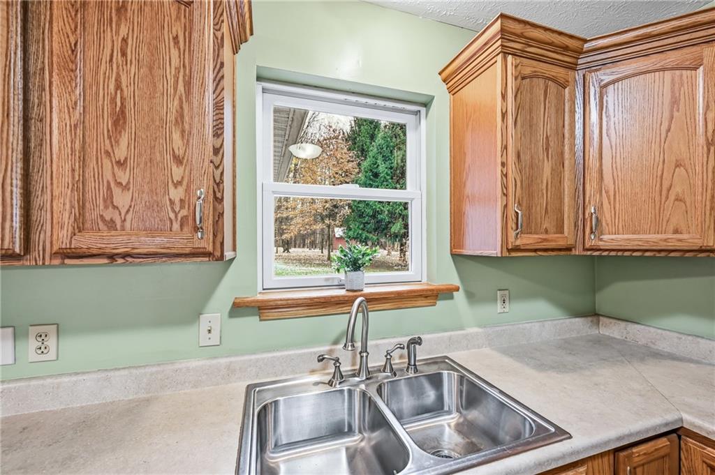3451 East State Road Jamestown, PA 16134 - Photo 10 of 49 a kitchen with a sink and a window