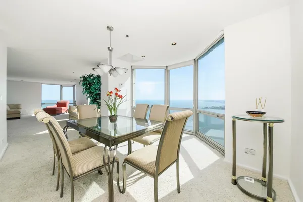 a view of a dining room with furniture
