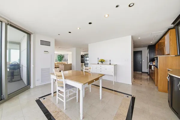 a view of a dining room with furniture