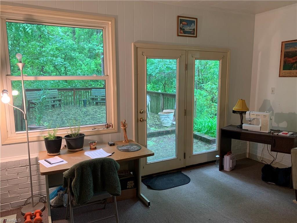 4680 Seward Road Pfafftown, NC 27040 - Photo 18 of 22 SUN ROOM LOOKING ONTO OVER SIZED DECK