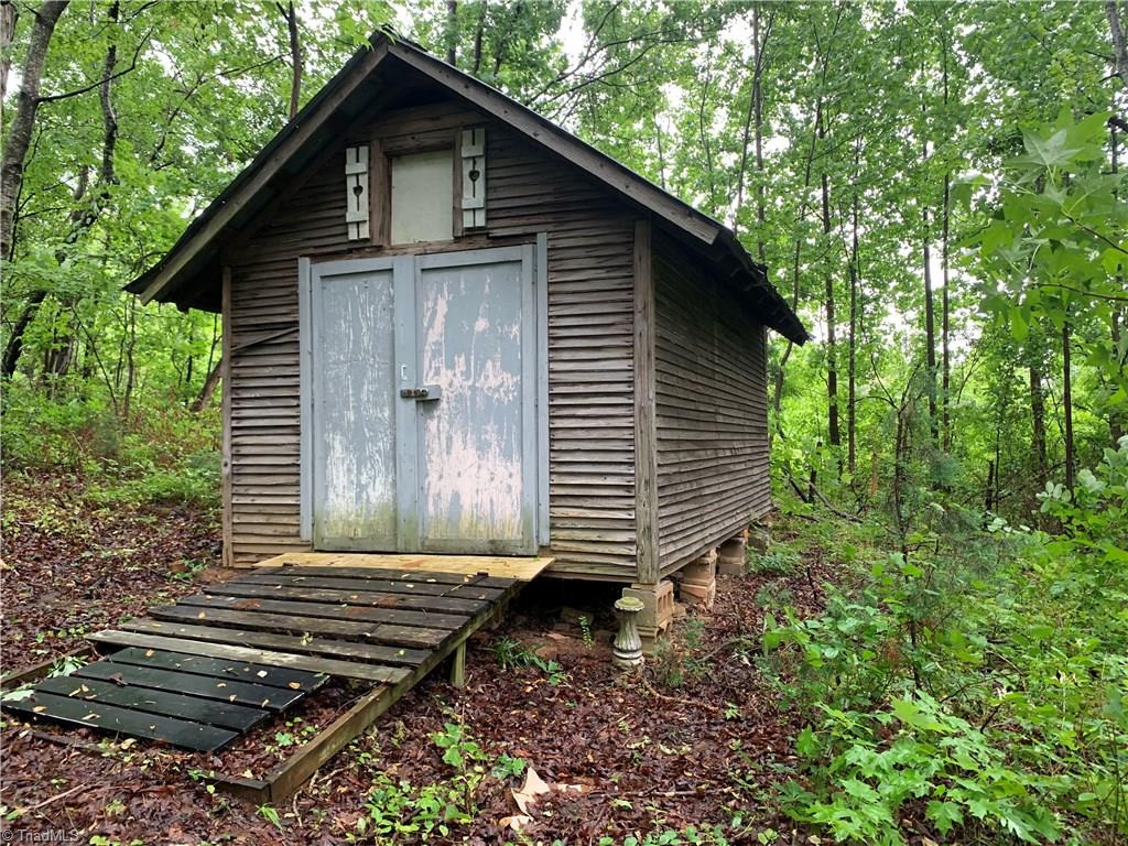 4680 Seward Road Pfafftown, NC 27040 - Photo 3 of 22 OUT BUILDING/SHE SHED SURROUND BY NATURE ON THE 1.7 ACRES
