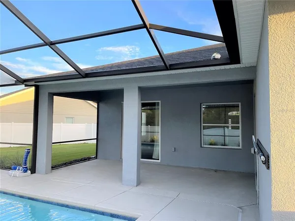 a view of an outdoor space with swimming pool