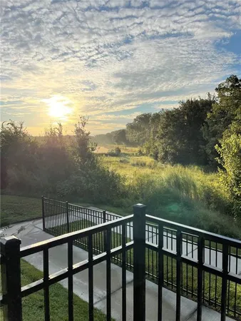 a view of a lake from a balcony