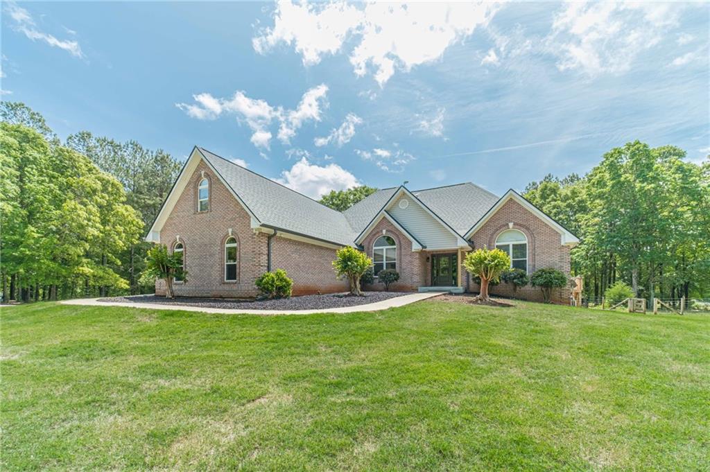 4415 Locklin Road Monroe, GA 30655 - Photo 12 of 79 a view of a house with a yard