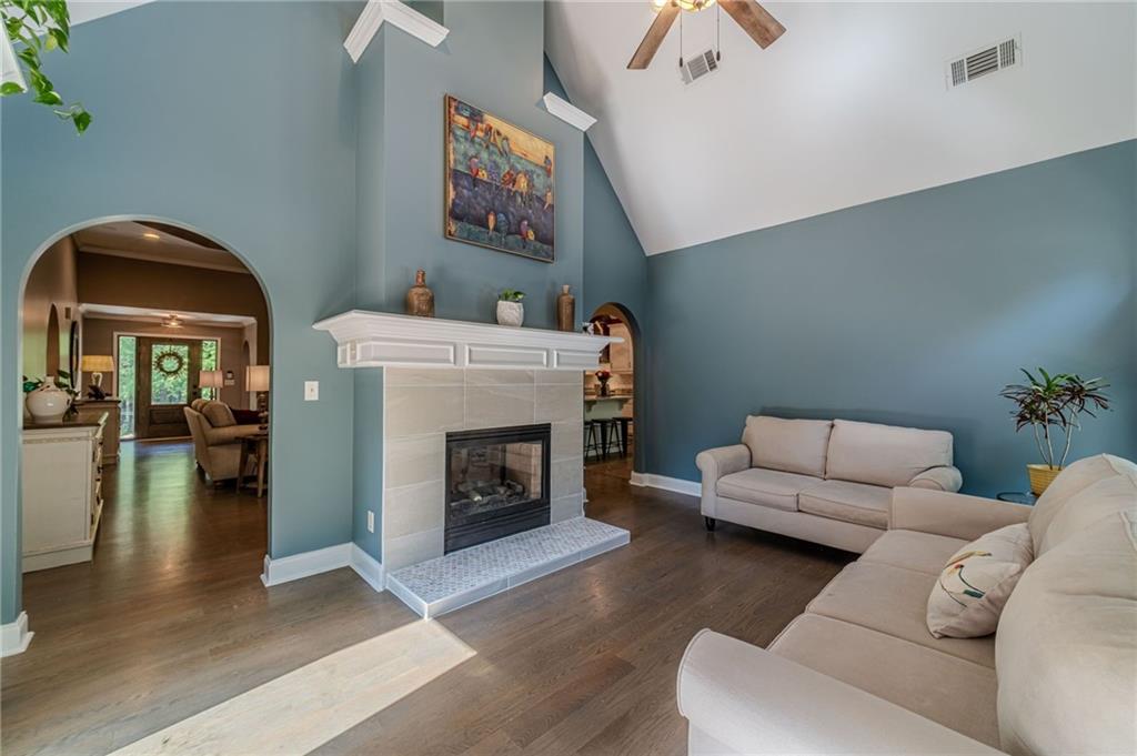 4415 Locklin Road Monroe, GA 30655 - Photo 21 of 79 a living room with furniture and a fireplace