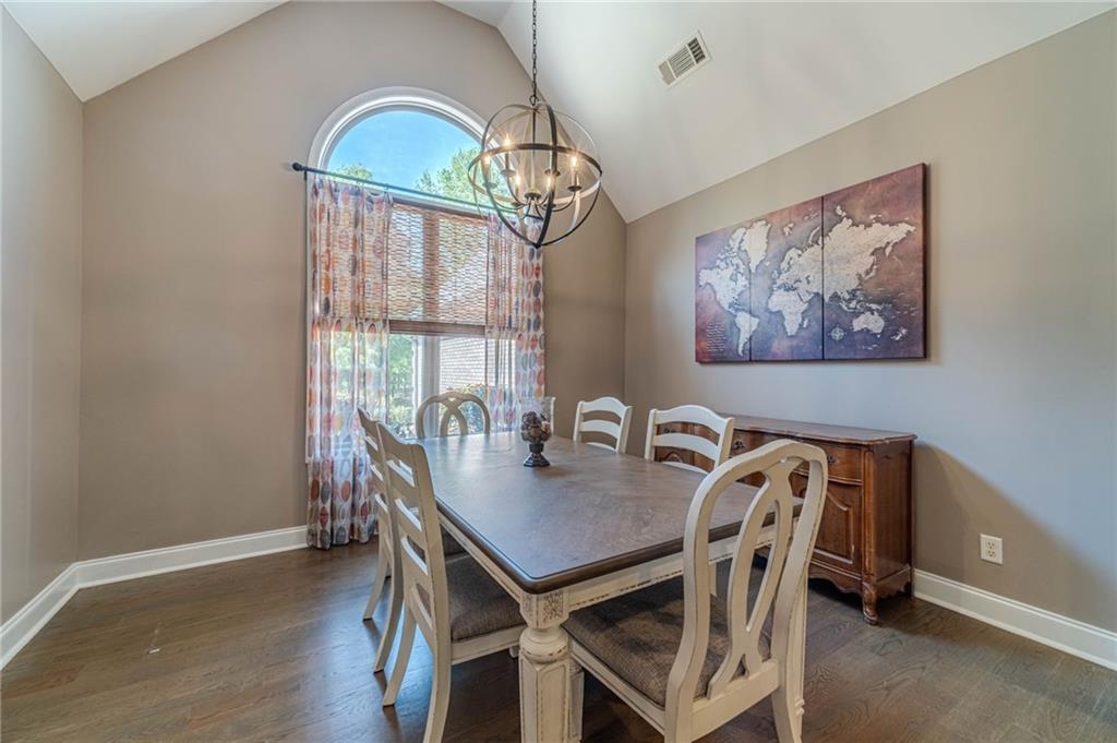 4415 Locklin Road Monroe, GA 30655 - Photo 23 of 79 a view of a dining room with furniture window and wooden floor