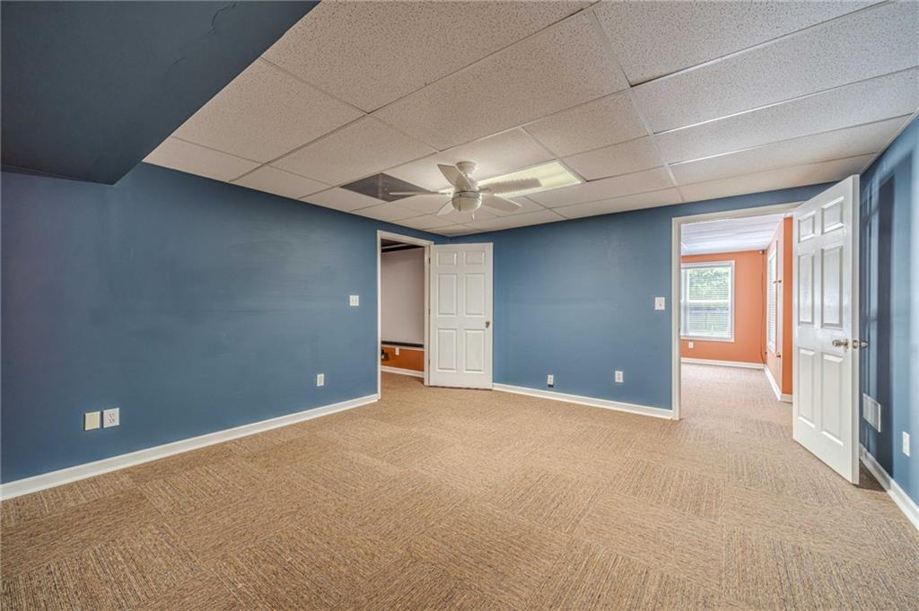 4415 Locklin Road Monroe, GA 30655 - Photo 45 of 79 an empty room with closet and windows