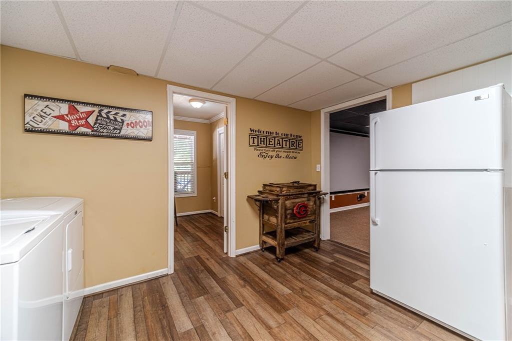 4415 Locklin Road Monroe, GA 30655 - Photo 48 of 79 a view of utility room with closet and wooden floor