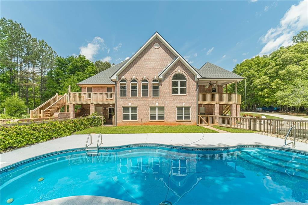 4415 Locklin Road Monroe, GA 30655 - Photo 54 of 79 a front view of a house with a yard