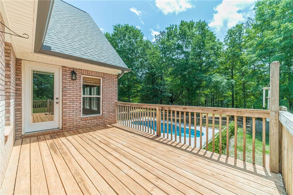 4415 Locklin Road Monroe, GA 30655 - Photo 55 of 79 a view of a wooden deck