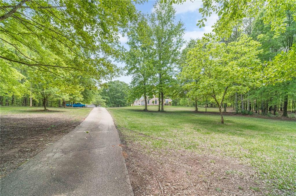 4415 Locklin Road Monroe, GA 30655 - Photo 66 of 79 a view of a park with large trees