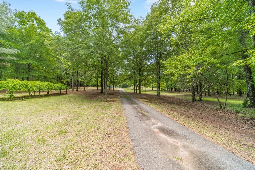 4415 Locklin Road Monroe, GA 30655 - Photo 69 of 79 a view of outdoor space with deck area