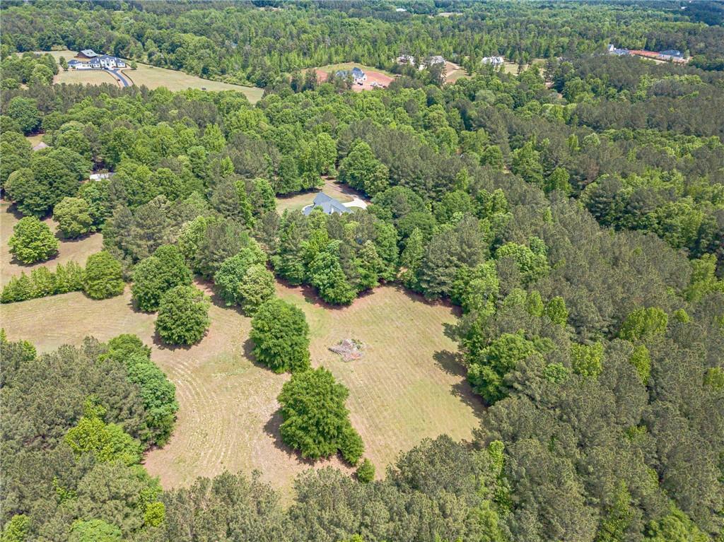 4415 Locklin Road Monroe, GA 30655 - Photo 78 of 79 an aerial view of residential house with outdoor space and trees all around