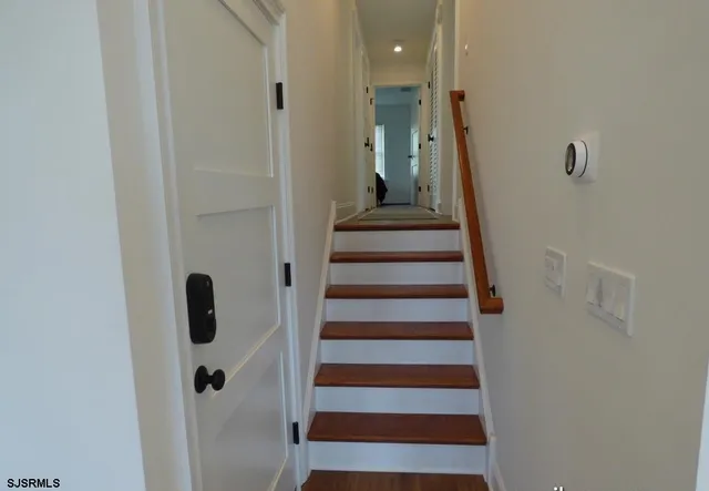 a view of hallway with stairs