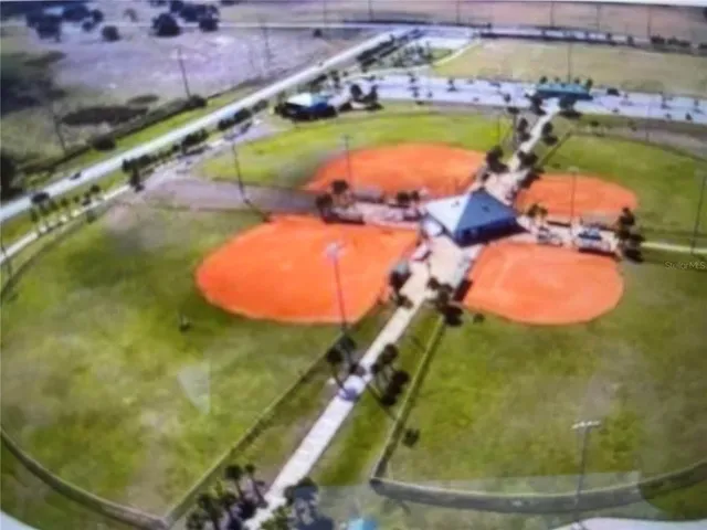 a view of a porch with potted plants