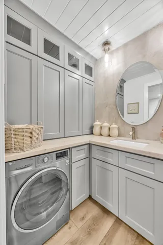 a bathroom with a sink and a mirror