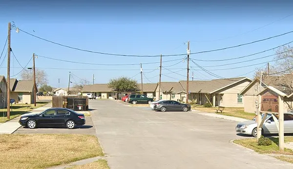 a view of a street with cars