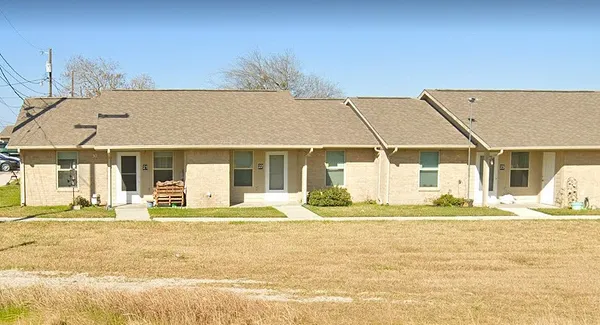 a view of a house with a swimming pool