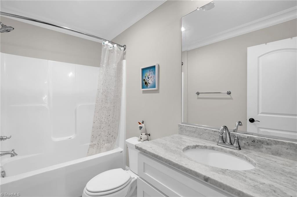 8442 Fairgrove Church Road Browns Summit, NC 27214 - Photo 14 of 24 Full bath hallway upstairs