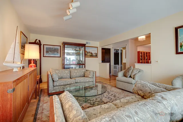 a living room with furniture and a couch