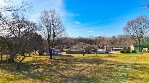 a view of a lake with a house