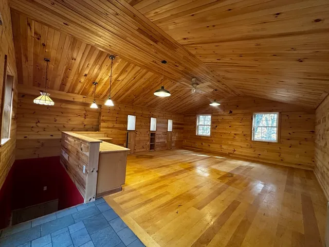 a view of a refrigerator in a bathroom