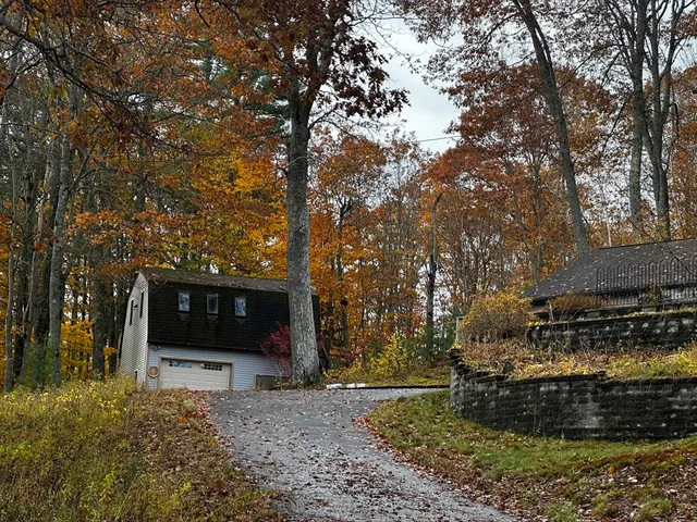 a view of a couches under an umbrella