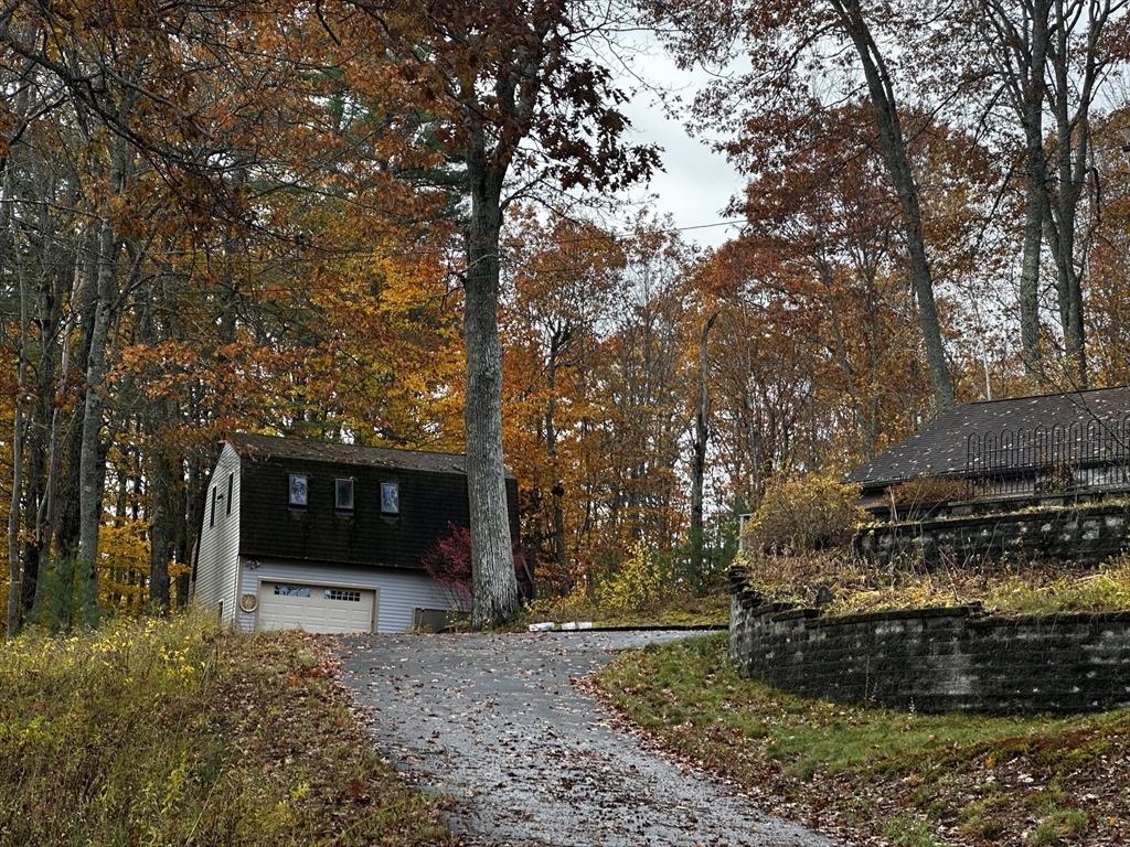 46 Swan Point Road Rindge, NH 03461 - Photo 4 of 42 a view of a couches under an umbrella
