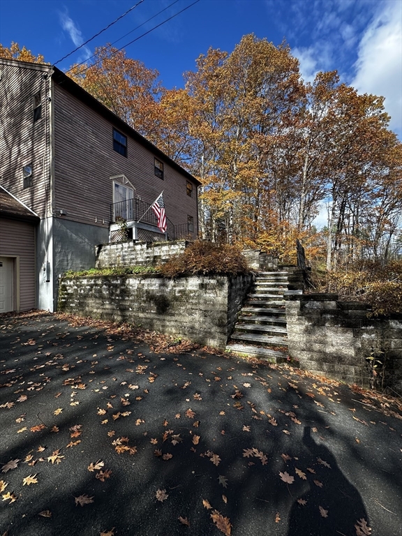 46 Swan Point Road Rindge, NH 03461 - Photo 41 of 42 a backyard of a house with lots of green space