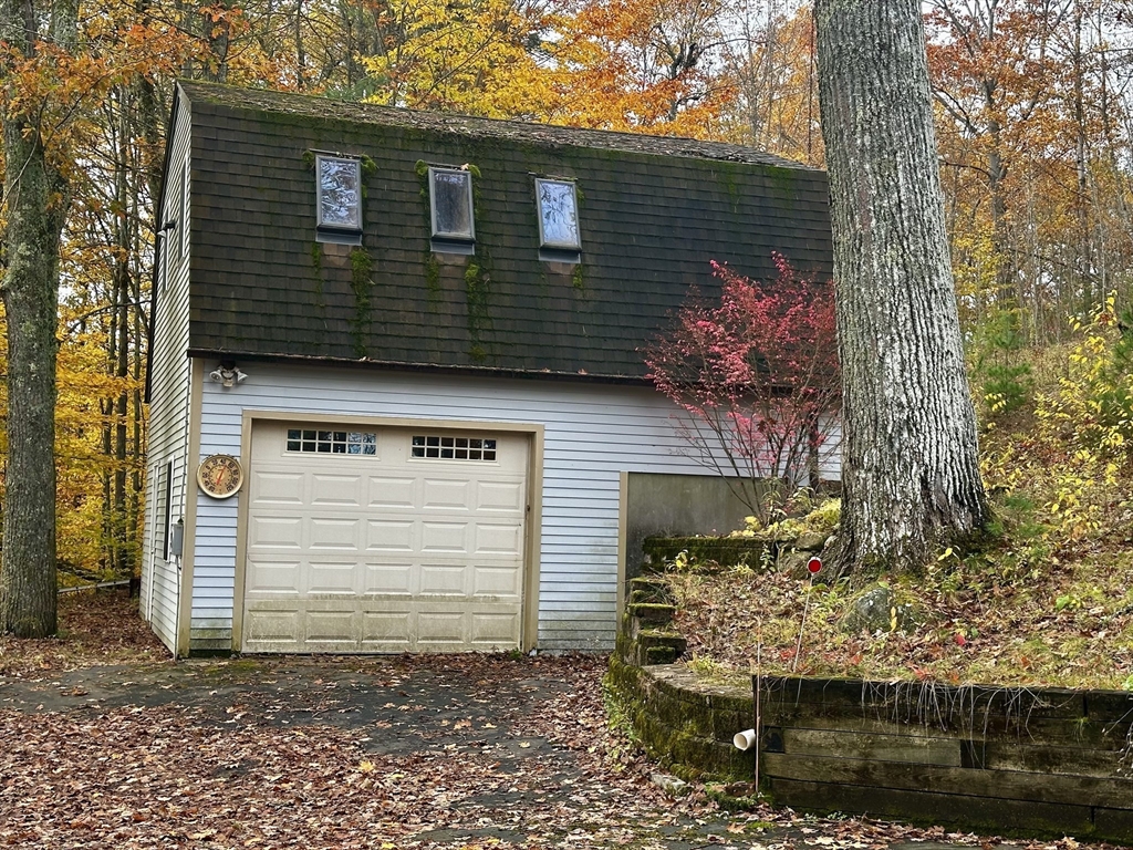 46 Swan Point Road Rindge, NH 03461 - Photo 6 of 42 a front view of a house with a yard