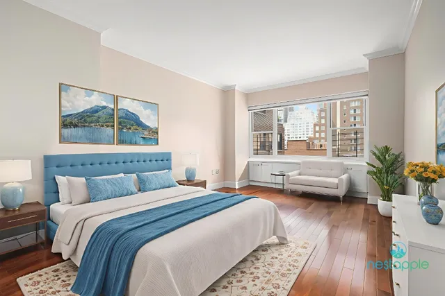 a bedroom with a bed and a couch