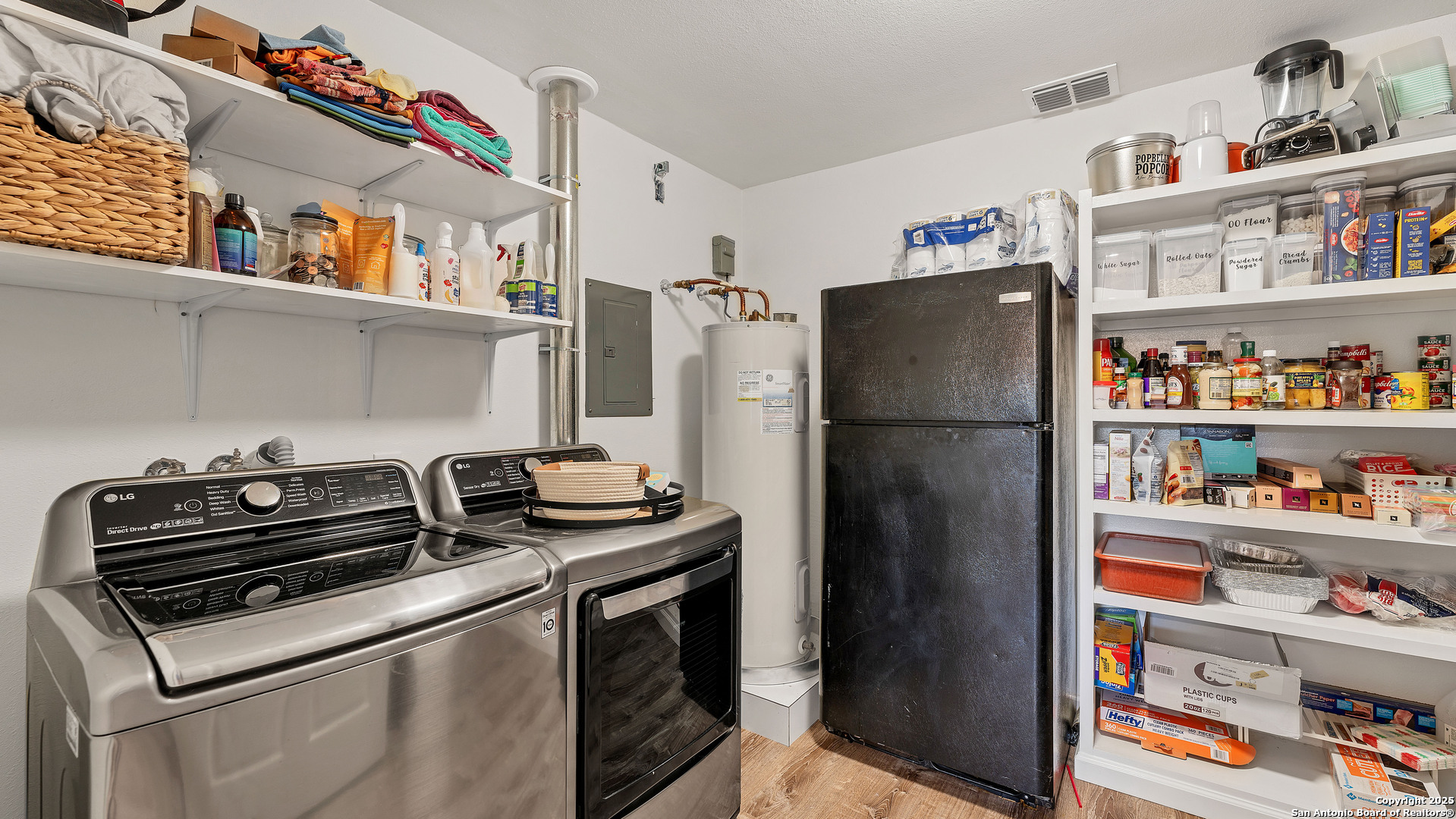 404 Reiley Road Seguin, TX 78155 - Photo 15 of 45 a kitchen with stainless steel appliances granite countertop a refrigerator and a sink