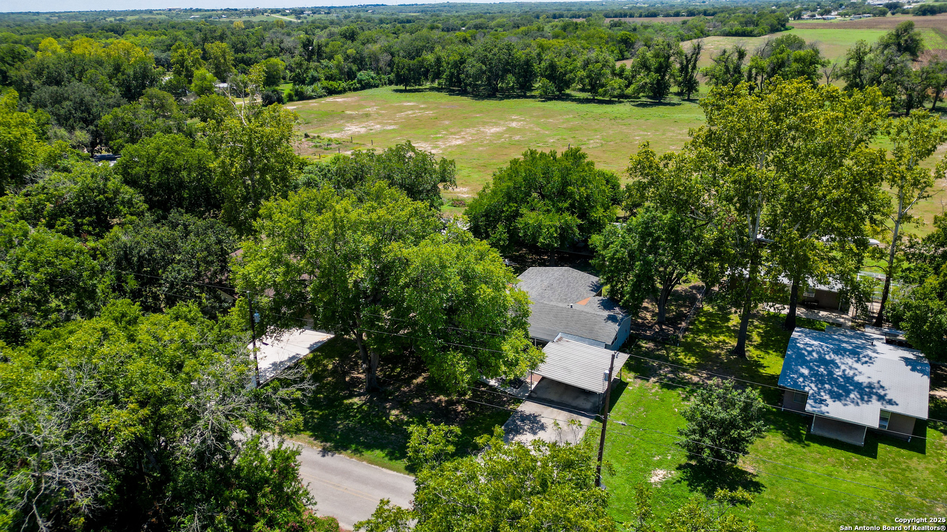 404 Reiley Road Seguin, TX 78155 - Photo 37 of 45 an aerial view of residential house with outdoor space