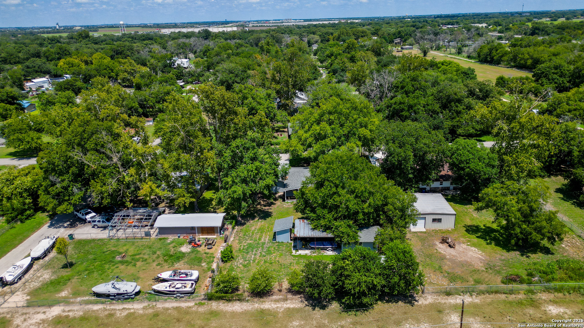 404 Reiley Road Seguin, TX 78155 - Photo 40 of 45 an aerial view of a house with a yard basket ball court and outdoor seating