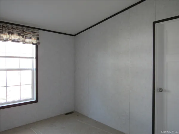 a view of empty room with window