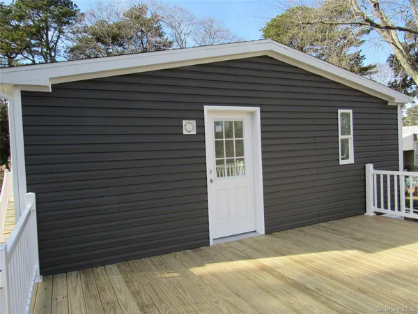 a front view of a house with a garage