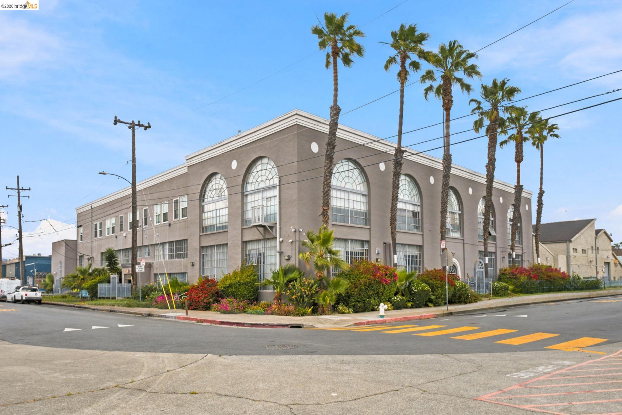 1920 Union Street, Unit 9 Oakland, CA 94607 - Photo 28 of 35 Corner property featuring a gray facade with white trim