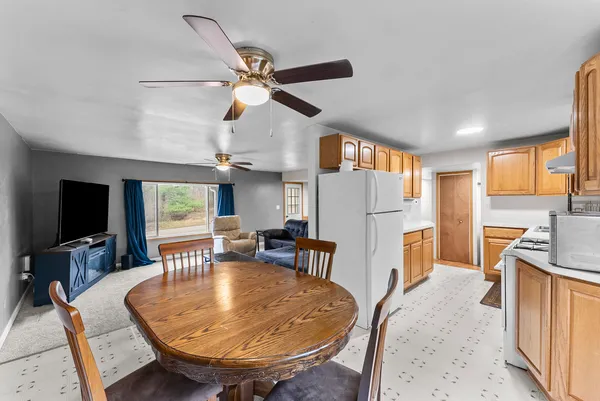 a view of a dining room with furniture