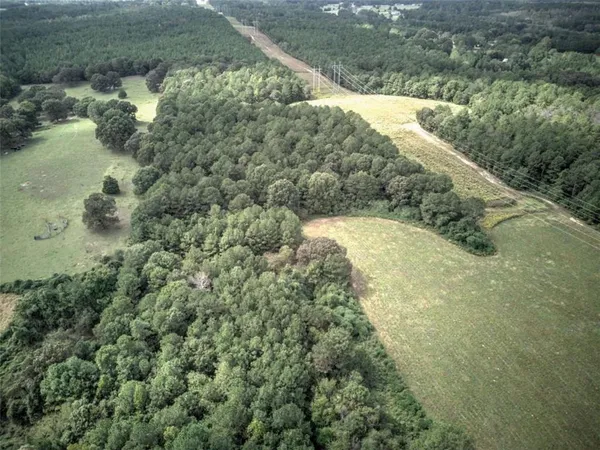 a view of a lake with big yard