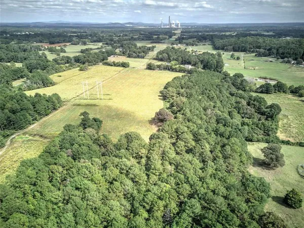 a view of a lake with a yard