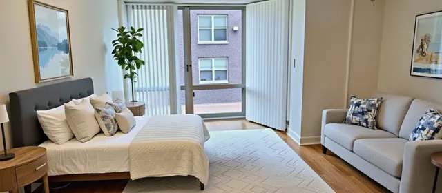 a utility room with multiple dryer and washer